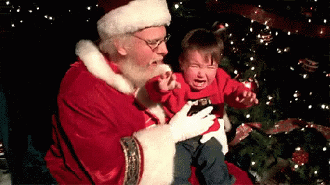Père Noël fait pleurer un enfant Gifs animés